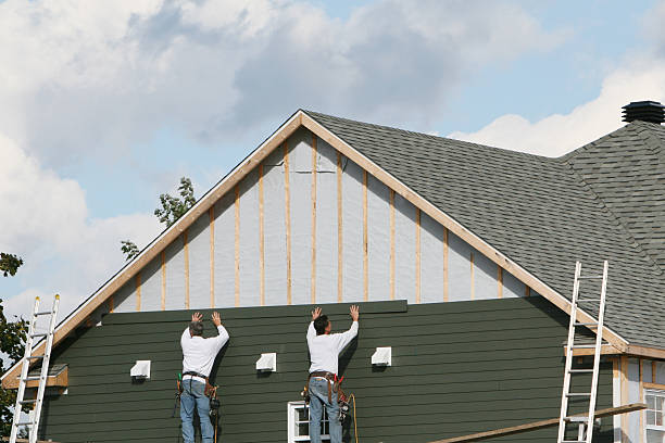 Professional Siding technician working in Webster, PA